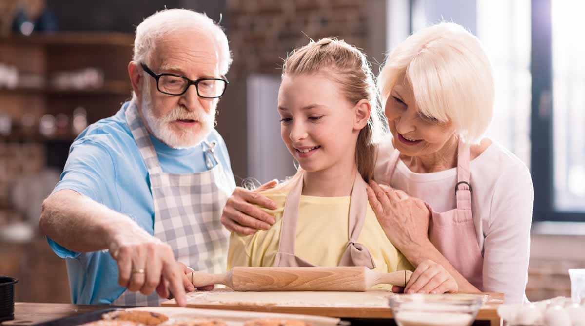 Grandparents visiting with grandchild